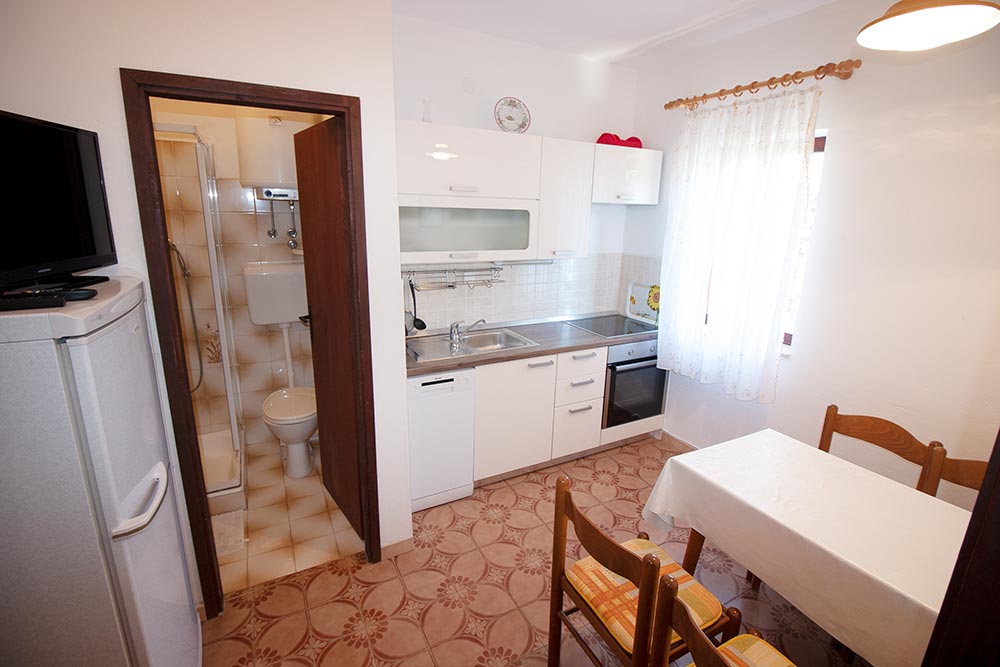 Living and dining area in Apartment S2-B