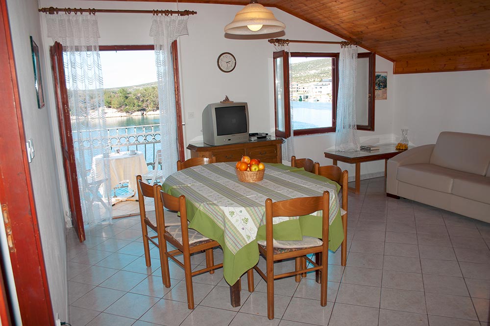 Kitchen and dining area in Apartment S3-A with practical layout